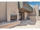 Inviting rooftop terrace with a fireplace, ideal for enjoying outdoor living and entertaining at 3030 N Hayden Rd # 28, Scottsdale, AZ 85251