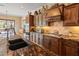 Gorgeous kitchen featuring granite countertops, stainless steel appliances, and custom cabinets at 31705 N 128Th Dr, Peoria, AZ 85383