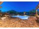 Inviting backyard pool and spa area with mountain views and desert landscaping for tranquil outdoor living at 31705 N 128Th Dr, Peoria, AZ 85383