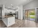 Kitchen area boasting modern stainless steel appliances, stone countertops, and lots of storage at 3248 W Sunshine Butte Dr, San Tan Valley, AZ 85144