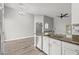 Bright kitchen featuring granite countertops, stainless steel appliances, and white cabinetry at 3248 W Sunshine Butte Dr, San Tan Valley, AZ 85144