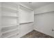 Spacious walk-in closet with shelves and rods for optimal storage and organization at 3248 W Sunshine Butte Dr, San Tan Valley, AZ 85144