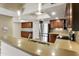 Modern kitchen features stainless steel appliances, sleek countertops, and wood cabinetry at 33 W Missouri Ave # 17, Phoenix, AZ 85013