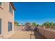 Spacious backyard features a covered patio, block fencing and low maintenance landscape at 3365 N Sunaire --, Mesa, AZ 85215