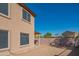 View of the spacious backyard with a block wall and covered patio at 3365 N Sunaire --, Mesa, AZ 85215