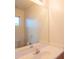 Vanity mirror in bathroom with a large sink, toilet and vanity lights at 3365 N Sunaire --, Mesa, AZ 85215