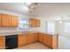 The kitchen is well-equipped with ample cabinet space, and a peninsula, providing a functional cooking area at 3365 N Sunaire --, Mesa, AZ 85215