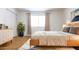 This bedroom features neutral tones, creating a calming atmosphere and enhancing the appeal of the room at 3556 W Augusta Ave, Phoenix, AZ 85051