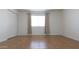 The tile bedroom has a window, closet and neutral colors at 3556 W Augusta Ave, Phoenix, AZ 85051