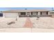 Inviting single-story home with well-kept landscaping and a brick walkway at 3556 W Augusta Ave, Phoenix, AZ 85051