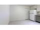 A kitchen and dining area with a fridge and tile floors at 3556 W Augusta Ave, Phoenix, AZ 85051
