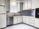 Functional kitchen featuring white appliances and ample counter space at 3556 W Augusta Ave, Phoenix, AZ 85051