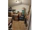 Storage attic with stacked boxes, baskets, and containers of varying sizes at 36119 W Catalan St, Maricopa, AZ 85138