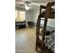 Charming ' bedroom with a sturdy wooden bunk bed and a cozy study corner at 3811 E Evans Dr, Phoenix, AZ 85032