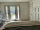 Bedroom view of outdoor patio featuring French doors and board and batten feature wall at 3811 E Evans Dr, Phoenix, AZ 85032