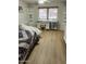 Bedroom with a desk, shelving, and a cozy quilt covered bed and neutral floors at 3811 E Evans Dr, Phoenix, AZ 85032