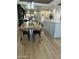 Inviting dining room showcasing a farmhouse-style table and an open floor plan at 3811 E Evans Dr, Phoenix, AZ 85032
