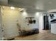 Entryway featuring modern decor, coat rack, and wood bench at 3811 E Evans Dr, Phoenix, AZ 85032
