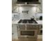 Professional series Forno gas range, with pot filler, is set against a herringbone tile backsplash at 3811 E Evans Dr, Phoenix, AZ 85032