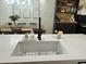 Bright kitchen featuring a white quartz countertop and stylish black fixtures at 3811 E Evans Dr, Phoenix, AZ 85032
