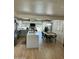 Open floor plan offering kitchen and dining areas perfect for gatherings and entertaining at 3811 E Evans Dr, Phoenix, AZ 85032