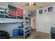 A cozy bedroom featuring a loft bed with built-in desk and an American flag accent at 3936 E Narrowleaf Dr, Gilbert, AZ 85298