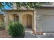 Welcoming front entrance with a covered porch and a view of the well-maintained garden at 3936 E Narrowleaf Dr, Gilbert, AZ 85298