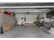Organized garage with storage cabinets, a clean floor, and functional layout at 3936 E Narrowleaf Dr, Gilbert, AZ 85298