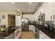 Kitchen features granite counters, stainless appliances, tile backsplash and stylish white cabinets at 3936 E Narrowleaf Dr, Gilbert, AZ 85298
