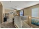 Bright and spacious loft area with cozy carpet and views from multiple windows at 3936 E Narrowleaf Dr, Gilbert, AZ 85298
