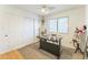 Cozy bedroom with a large closet, carpet flooring and natural light at 5263 E Hannibal St, Mesa, AZ 85205
