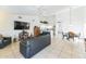 Spacious living room featuring high ceilings and an open layout to the kitchen at 5263 E Hannibal St, Mesa, AZ 85205
