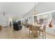 Open-concept living space featuring a chandelier and lots of natural light at 5263 E Hannibal St, Mesa, AZ 85205