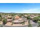 Neighborhood view showcasing an impeccably maintained desert landscape with golf course and mountains at 5345 E Mclellan Rd # 123, Mesa, AZ 85205