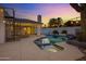 Backyard pool and patio area featuring a spa and desert landscaping at 5345 E Mclellan Rd # 123, Mesa, AZ 85205