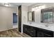 Bathroom with double sink vanity, mirrors and modern fixtures at 5345 E Mclellan Rd # 123, Mesa, AZ 85205