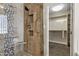 Walk-in shower with glass door and decorative tile, and closet at 5345 E Mclellan Rd # 123, Mesa, AZ 85205