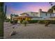 Desert home featuring a fountain and natural desert landscaping at 5345 E Mclellan Rd # 123, Mesa, AZ 85205