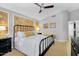 A spacious main bedroom with wallpaper and furnishings creates an elegant ambiance at 5711 E Gable Ave, Mesa, AZ 85206