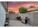 Outdoor cooking area with multiple grills and ample space for meal prep and outdoor entertaining at 5711 E Gable Ave, Mesa, AZ 85206