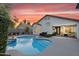 Inviting backyard featuring a sparkling pool, patio area, and lush landscaping, ideal for outdoor enjoyment at 5711 E Gable Ave, Mesa, AZ 85206