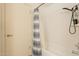 Bathroom features a shower-tub combination and white tile at 602 E Colgate Dr, Tempe, AZ 85283