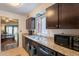 View of the kitchen with granite counters and stainless sink at 602 E Colgate Dr, Tempe, AZ 85283