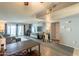 View of the living room with sliding glass doors to the backyard and neutral decor at 602 E Colgate Dr, Tempe, AZ 85283