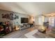 Comfortable living room with gray walls, wood floors, and entertainment center at 602 E Colgate Dr, Tempe, AZ 85283