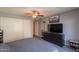 Bedroom offers wood-look flooring, large closet, ceiling fan, and neutral walls at 602 E Colgate Dr, Tempe, AZ 85283