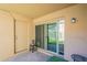 Cozy covered patio with access to artificial turf backyard through sliding glass door at 602 E Colgate Dr, Tempe, AZ 85283