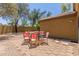 Beautiful backyard with patio, desert landscaping, and an inviting outdoor setting at 7003 S 23Rd Ln, Phoenix, AZ 85041