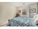 Comfortable bedroom featuring chair and large window at 7003 S 23Rd Ln, Phoenix, AZ 85041