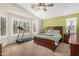 Spacious bedroom featuring bright windows and room for excercise equipment at 7003 S 23Rd Ln, Phoenix, AZ 85041